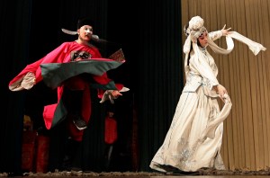 College students perform Peking Opera at a concert hall of National Academy of Chinese Theatre Arts, in Beijing
